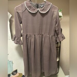 Girls polka dot dress sizes with flared sleeves and collar. Girls 12-13 years